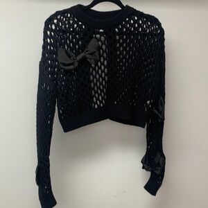 Woman black knitted top